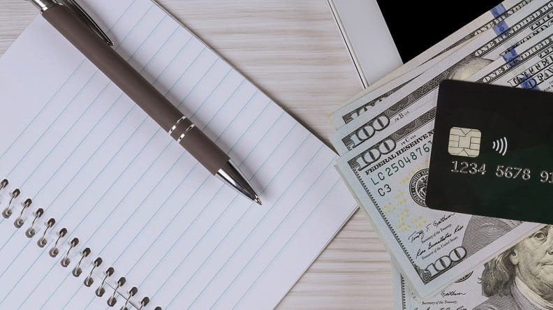 notepad with money